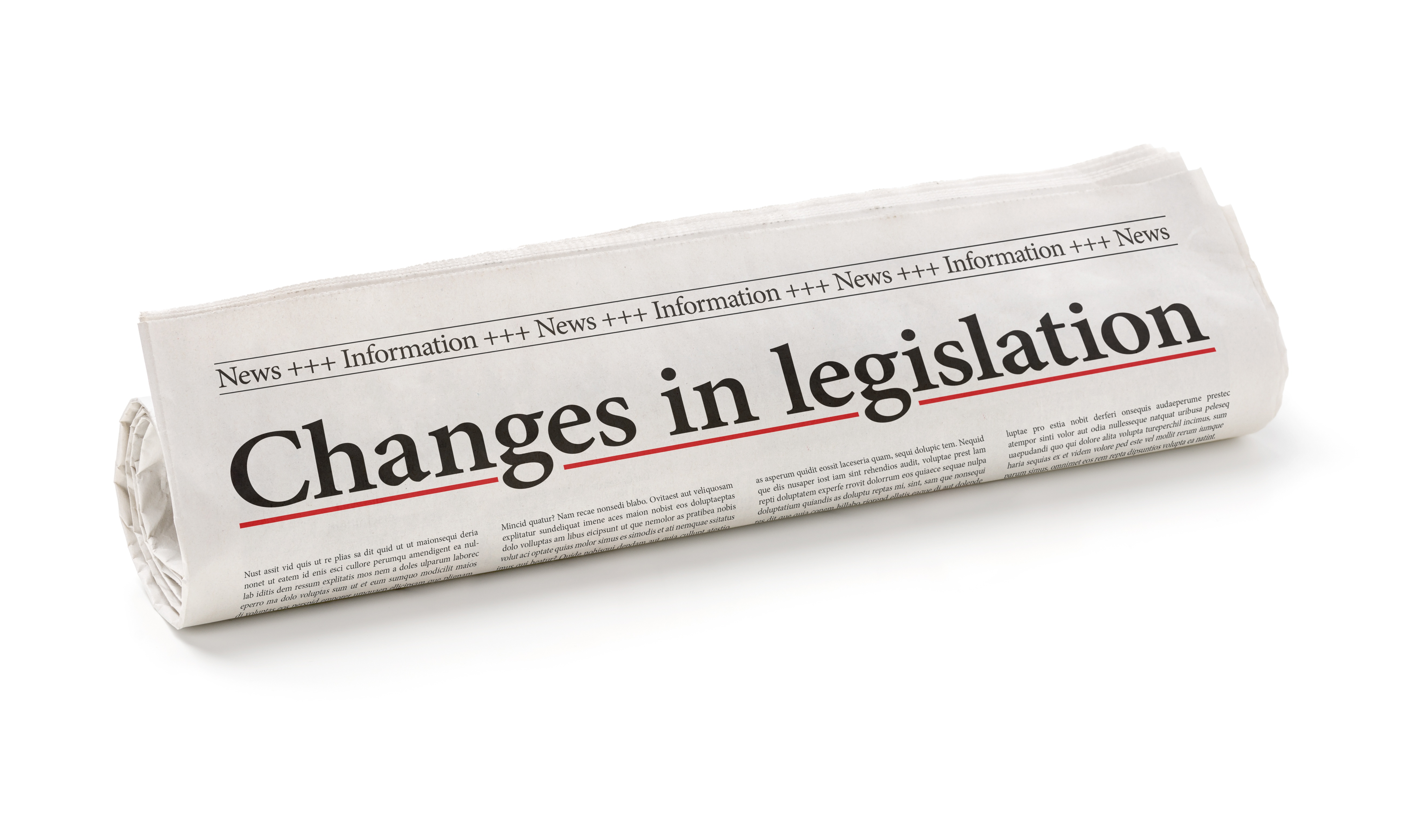 rolled newspaper with headline "Changes in legislation"